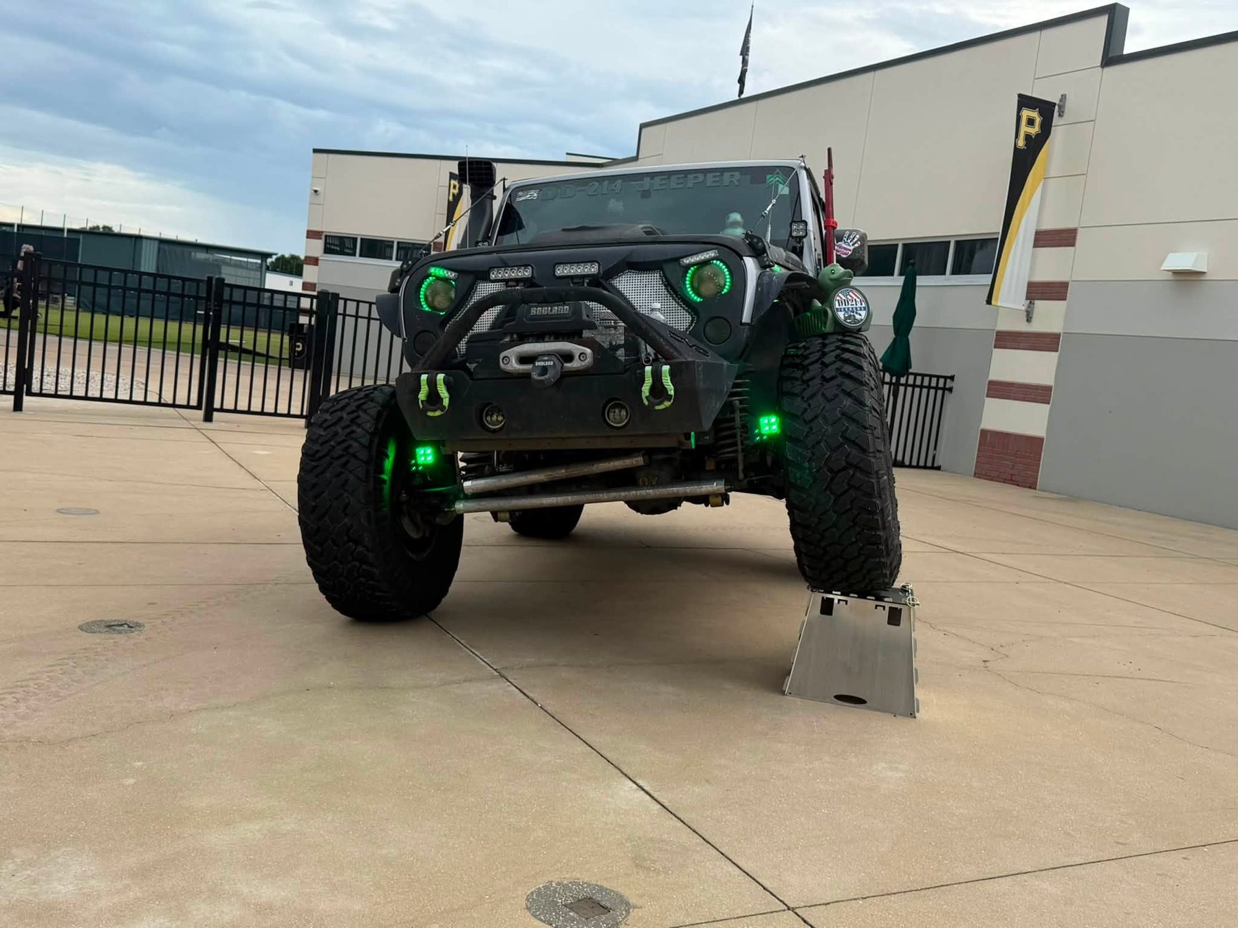 DD214 Jeepers lifted Jeep with green lighting